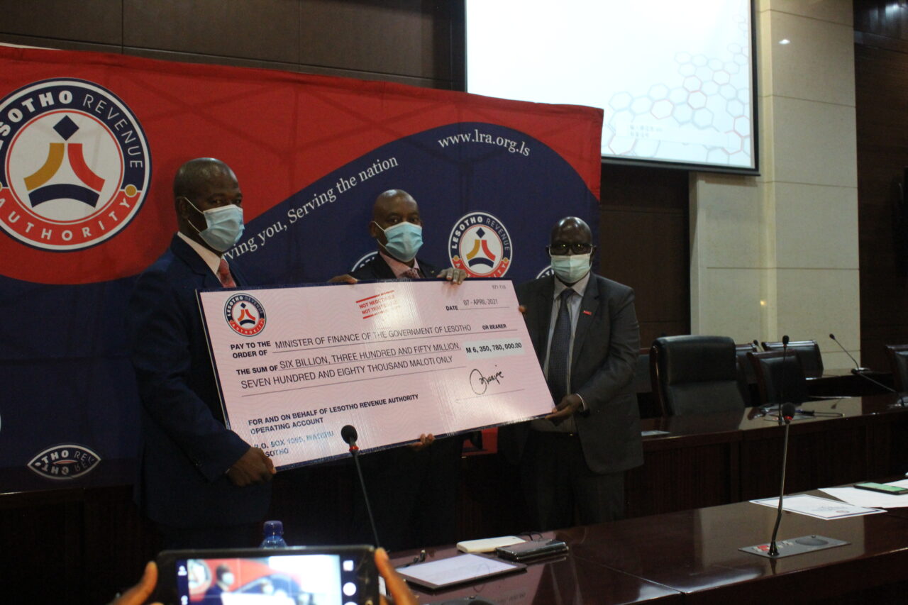 LRA_Commissioner_General_handing_over_tax_collection_cheque_to_Minister_of_Finance_50